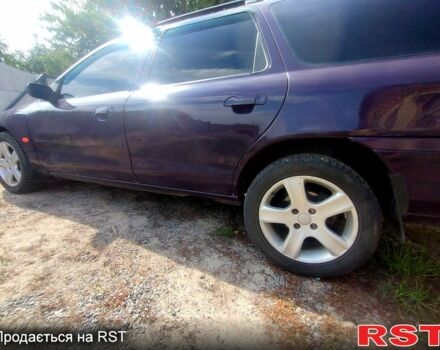 Фиолетовый Форд Мондео, объемом двигателя 2 л и пробегом 232 тыс. км за 1900 $, фото 4 на Automoto.ua