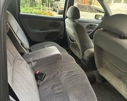 Фіолетовий Форд Мондео, об'ємом двигуна 1.8 л та пробігом 270 тис. км за 1850 $, фото 8 на Automoto.ua