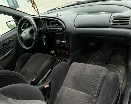 Коричневый Форд Мондео, объемом двигателя 1.6 л и пробегом 290 тыс. км за 500 $, фото 2 на Automoto.ua