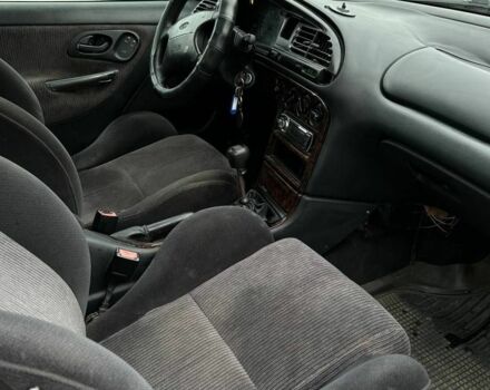 Коричневый Форд Мондео, объемом двигателя 1.6 л и пробегом 290 тыс. км за 500 $, фото 13 на Automoto.ua