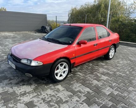 Красный Форд Мондео, объемом двигателя 1.8 л и пробегом 100 тыс. км за 1900 $, фото 1 на Automoto.ua