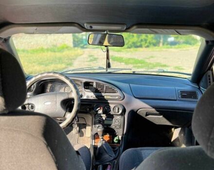 Красный Форд Мондео, объемом двигателя 1.6 л и пробегом 350 тыс. км за 1100 $, фото 6 на Automoto.ua