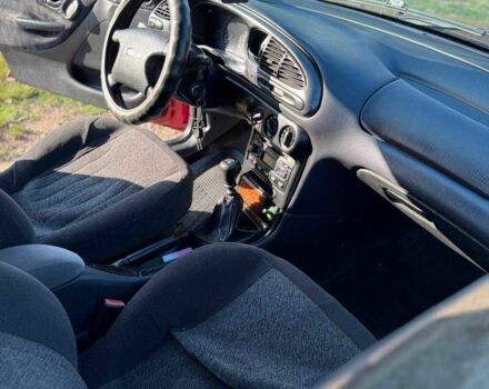 Красный Форд Мондео, объемом двигателя 1.6 л и пробегом 350 тыс. км за 1100 $, фото 7 на Automoto.ua