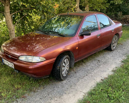 Красный Форд Мондео, объемом двигателя 1.8 л и пробегом 310 тыс. км за 1500 $, фото 1 на Automoto.ua