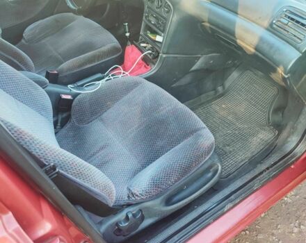 Красный Форд Мондео, объемом двигателя 2 л и пробегом 346 тыс. км за 2500 $, фото 9 на Automoto.ua