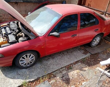 Красный Форд Мондео, объемом двигателя 1.8 л и пробегом 376 тыс. км за 1200 $, фото 1 на Automoto.ua