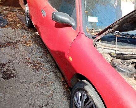 Красный Форд Мондео, объемом двигателя 1.8 л и пробегом 376 тыс. км за 1200 $, фото 2 на Automoto.ua