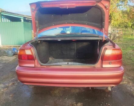 Красный Форд Мондео, объемом двигателя 2 л и пробегом 346 тыс. км за 2500 $, фото 2 на Automoto.ua