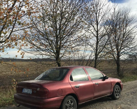 Красный Форд Мондео, объемом двигателя 1.8 л и пробегом 310 тыс. км за 1500 $, фото 4 на Automoto.ua