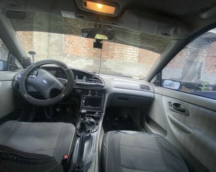 Червоний Форд Мондео, об'ємом двигуна 1.6 л та пробігом 261 тис. км за 1600 $, фото 6 на Automoto.ua