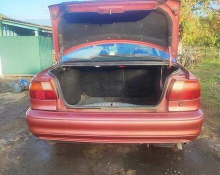 Красный Форд Мондео, объемом двигателя 2 л и пробегом 346 тыс. км за 2500 $, фото 1 на Automoto.ua