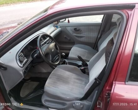 Красный Форд Мондео, объемом двигателя 1.6 л и пробегом 340 тыс. км за 1200 $, фото 7 на Automoto.ua