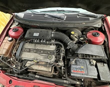 Червоний Форд Мондео, об'ємом двигуна 2 л та пробігом 333 тис. км за 1100 $, фото 4 на Automoto.ua