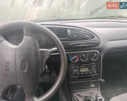 Красный Форд Мондео, объемом двигателя 1.6 л и пробегом 194 тыс. км за 2700 $, фото 10 на Automoto.ua