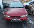 Красный Форд Мондео, объемом двигателя 1.8 л и пробегом 400 тыс. км за 1300 $, фото 1 на Automoto.ua