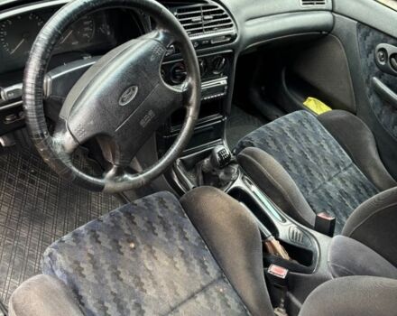 Красный Форд Мондео, объемом двигателя 1.6 л и пробегом 300 тыс. км за 1100 $, фото 2 на Automoto.ua