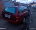 Червоний Форд Мондео, об'ємом двигуна 1.8 л та пробігом 300 тис. км за 1050 $, фото 4 на Automoto.ua