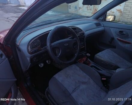 Червоний Форд Мондео, об'ємом двигуна 1.8 л та пробігом 300 тис. км за 1050 $, фото 6 на Automoto.ua