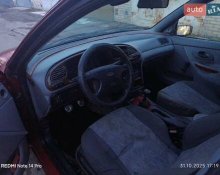 Красный Форд Мондео, объемом двигателя 1.75 л и пробегом 300 тыс. км за 1050 $, фото 3 на Automoto.ua