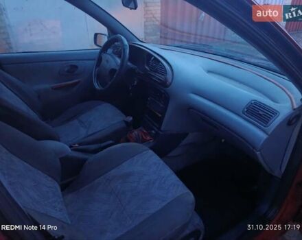 Красный Форд Мондео, объемом двигателя 1.75 л и пробегом 300 тыс. км за 1050 $, фото 4 на Automoto.ua