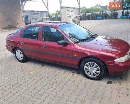 Червоний Форд Мондео, об'ємом двигуна 1.8 л та пробігом 413 тис. км за 1350 $, фото 38 на Automoto.ua