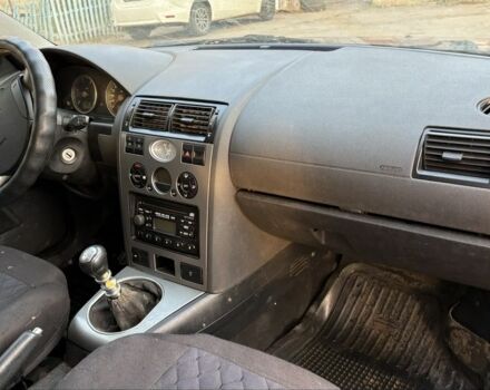 Красный Форд Мондео, объемом двигателя 2 л и пробегом 280 тыс. км за 1450 $, фото 11 на Automoto.ua