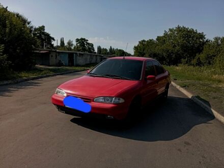 Форд Мондео 1993 у Першотравенске на Automoto.ua Червоний Форд Мондео, об'ємом двигуна 1.8 л та пробігом 221 тис. км за 1975 $, фото 1 на Automoto.ua