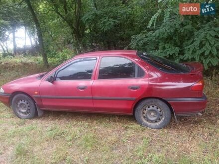 Красный Форд Мондео, объемом двигателя 1.8 л и пробегом 370 тыс. км за 2050 $, фото 1 на Automoto.ua