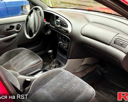 Красный Форд Мондео, объемом двигателя 1.8 л и пробегом 200 тыс. км за 13200 $, фото 1 на Automoto.ua