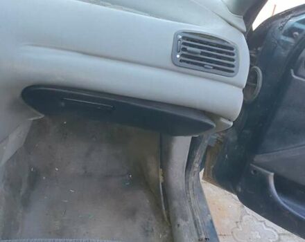 Форд Мондео, объемом двигателя 1.8 л и пробегом 400 тыс. км за 1000 $, фото 6 на Automoto.ua