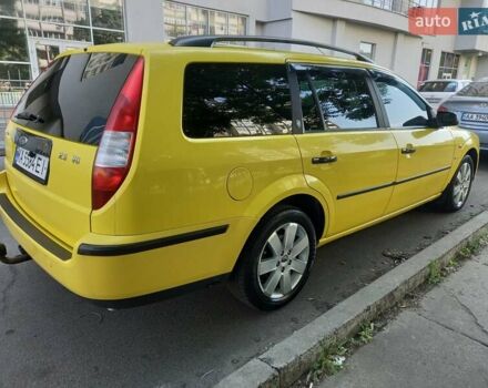 Желтый Форд Мондео, объемом двигателя 2.5 л и пробегом 430 тыс. км за 4100 $, фото 1 на Automoto.ua