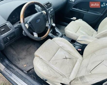 Желтый Форд Мондео, объемом двигателя 2 л и пробегом 390 тыс. км за 1999 $, фото 8 на Automoto.ua