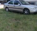 Серый Форд Мондео, объемом двигателя 1.8 л и пробегом 250 тыс. км за 1350 $, фото 1 на Automoto.ua
