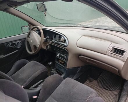 Сірий Форд Мондео, об'ємом двигуна 1.8 л та пробігом 416 тис. км за 643 $, фото 5 на Automoto.ua