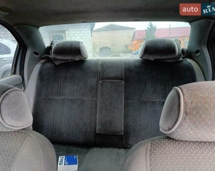 Серый Форд Мондео, объемом двигателя 1.8 л и пробегом 438 тыс. км за 900 $, фото 5 на Automoto.ua