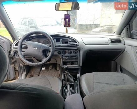 Серый Форд Мондео, объемом двигателя 1.8 л и пробегом 438 тыс. км за 900 $, фото 4 на Automoto.ua