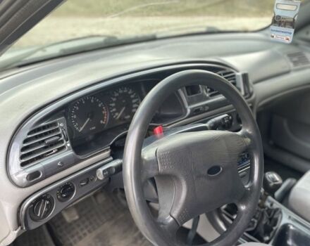 Сірий Форд Мондео, об'ємом двигуна 1.8 л та пробігом 200 тис. км за 1600 $, фото 7 на Automoto.ua