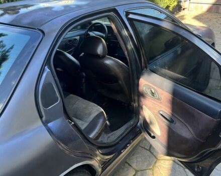 Серый Форд Мондео, объемом двигателя 2 л и пробегом 150 тыс. км за 1250 $, фото 2 на Automoto.ua