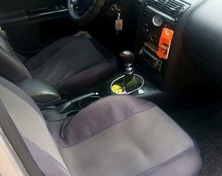 Сірий Форд Мондео, об'ємом двигуна 2 л та пробігом 262 тис. км за 3200 $, фото 3 на Automoto.ua