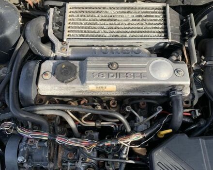 Серый Форд Мондео, объемом двигателя 1.8 л и пробегом 211 тыс. км за 1200 $, фото 7 на Automoto.ua