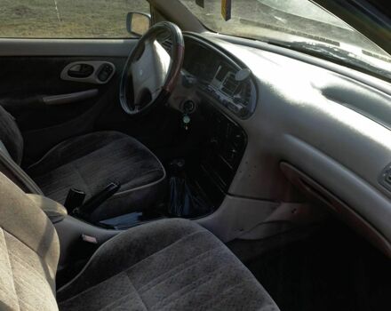 Серый Форд Мондео, объемом двигателя 1.8 л и пробегом 211 тыс. км за 1200 $, фото 4 на Automoto.ua