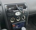 Сірий Форд Мондео, об'ємом двигуна 2 л та пробігом 370 тис. км за 1909 $, фото 5 на Automoto.ua