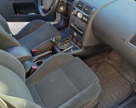 Серый Форд Мондео, объемом двигателя 1.8 л и пробегом 226 тыс. км за 4700 $, фото 10 на Automoto.ua