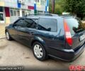 Сірий Форд Мондео, об'ємом двигуна 1.8 л та пробігом 259 тис. км за 5600 $, фото 2 на Automoto.ua
