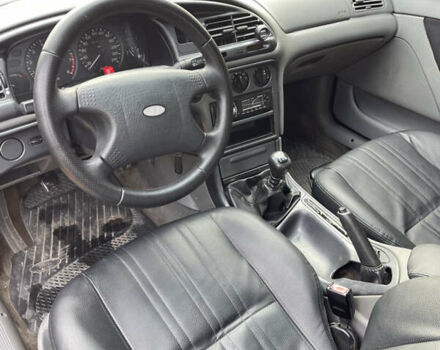 Серый Форд Мондео, объемом двигателя 1.8 л и пробегом 351 тыс. км за 1799 $, фото 10 на Automoto.ua