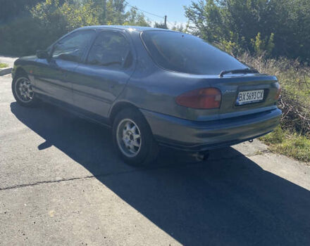 Серый Форд Мондео, объемом двигателя 1.8 л и пробегом 365 тыс. км за 2000 $, фото 2 на Automoto.ua