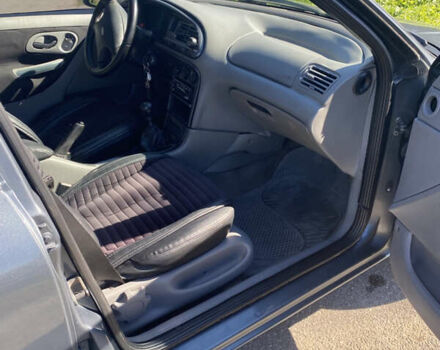 Серый Форд Мондео, объемом двигателя 1.8 л и пробегом 365 тыс. км за 2000 $, фото 5 на Automoto.ua