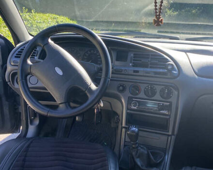 Серый Форд Мондео, объемом двигателя 1.8 л и пробегом 365 тыс. км за 2000 $, фото 13 на Automoto.ua