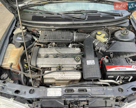 Серый Форд Мондео, объемом двигателя 1.8 л и пробегом 351 тыс. км за 1799 $, фото 12 на Automoto.ua