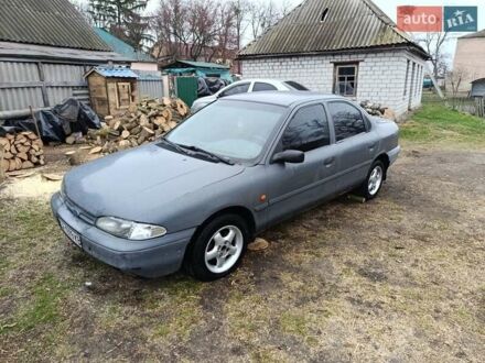 Серый Форд Мондео, объемом двигателя 1.8 л и пробегом 438 тыс. км за 900 $, фото 1 на Automoto.ua